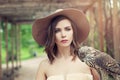 Nice woman with bird outdoors portrait Royalty Free Stock Photo