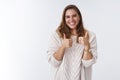 Nice work keep up. Portrait supportive charming outgoing attractive young modern woman showing thumbs up smiling broadly