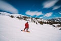 Young man snowboarding in the Austrian Alps Royalty Free Stock Photo