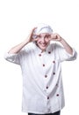 Nice young woman chef is looking something Royalty Free Stock Photo