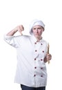 Nice young woman chef with thumb down and wood utensils Royalty Free Stock Photo