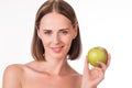 Nice young woman holding an apple Royalty Free Stock Photo