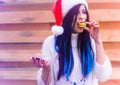 Happy Christmas holidays, girl eat sweets