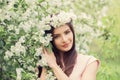 Nice young woman smiling and holding flowers Royalty Free Stock Photo