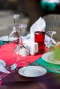 Nicely decorated table appointments with beautiful decor with plates and serviettes. The elegant dinner table Royalty Free Stock Photo