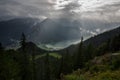 Nicely illuminated Achen lake with dramatic cloudy sky, The Brandenberg Alps, Austria, Europe