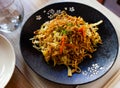Nicely served japanise style meal yakisoba with vegetables