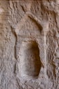 Niche carved into the rock in the city of Hegra Royalty Free Stock Photo