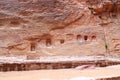Niche containing sacred stone Baetyl at gorge canyon Siq in ancient city of Petra, Jordan Royalty Free Stock Photo