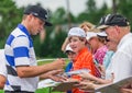 Nick Watney signs autographs at the 2013 US Open