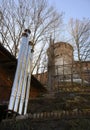 Nickel-plated shiny ventilation pipes on the background of the tower of the ancient Kremlin in Nizhny Novgorod