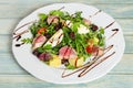 Nicoise salad with roasted tuna and boiled egg. Closeup view