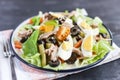 Nicoise salad with tuna, green beans, basil and fresh vegetables Royalty Free Stock Photo