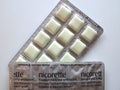 Nicotine chewing gums Nicorette to substitute smoking cigarettes Royalty Free Stock Photo