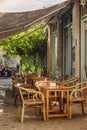 Nicosia, Cyprus, 09/03/2019: Cozy street village cafe under a canopy.