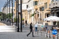 Nicosia, Cyprus - November 07, 2020: Woman wearing face mask walking on Eleftheria Square during Covid-19 pandemic