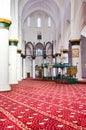 Nicosia, Cyprus - Oct 4th 2018: Beautifully decorated interior of muslim Selimiye Mosque in Cypriot Nicosia. White walls, columns