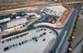 Aerial drone view of a modern designed motorwat junction. Road transportation at shopping center.