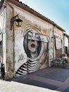 NICOSIA, CYPRUS - 09/11/2018: Street art - grafitti - on old building.