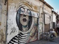 NICOSIA, CYPRUS - 09/11/2018: Street art - grafitti - on old building.