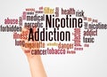 Nicotine addiction word cloud and hand with marker concept Royalty Free Stock Photo