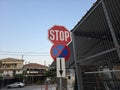 Nidri, Lefkada, Greece, June 26th 2025 - Stop sign and no stopping sign on the same pole Royalty Free Stock Photo