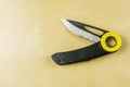 Petzl knife for cutting ropes. Royalty Free Stock Photo