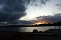 Niegocin lake Mazury Poland sunset on the lake with orange sky cloudy clouds platform