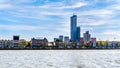 The Nieuwe Maas river with the Modern Sky Scrapers beside historic houses on the shore of Noordereiland in the center of Rotterdam Royalty Free Stock Photo