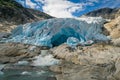 Nigardsbreen Glacier ice cave and river Royalty Free Stock Photo