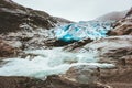 Nigardsbreen glacier and river in Norway Mountains