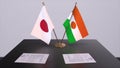 Niger and Japan national flags, political deal, diplomatic meeting. Politics and business 3D illustration