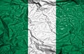 Nigeria vintage flag on old crumpled paper background