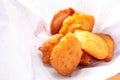 Nigerian Meal - Akara Fried Bean Cake served in newspaper Royalty Free Stock Photo