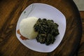 Nigerian Ponded yam served with Afang Soup