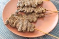 Nigerian spicy grilled Suya snack on a stick ready to eat Royalty Free Stock Photo