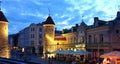 Nigh life style in Tallinn street cafe people have dinner and relax summer evening sunset in the old town of Tallinn, Estonia 10 Royalty Free Stock Photo