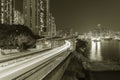 Night scenery of harbor and highway in Hong Kong city Royalty Free Stock Photo