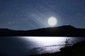 Dark night with full moon Royalty Free Stock Photo