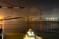 Night activity in industrial cargo port. Royalty Free Stock Photo