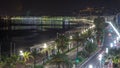 Night aerial panorama of Nice timelapse, France. Lighted Old Town little streets and waterfront Royalty Free Stock Photo