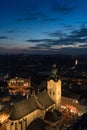Night aerial shoot of old Lviv city in Ukraine at the Lviv main square Rynok square during a Christmas fairs in old Ukrainian Royalty Free Stock Photo