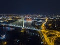 Night aerial view of Ada bridge and surrounding car interchange Royalty Free Stock Photo