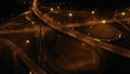 Night Aerial view of highway cloverleaf interchange intersection with ramps Royalty Free Stock Photo