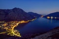 Night aerial view of seashore of Boka Kotorska in Montenegro at blue hour. Wonderful twilight Adriatic seascape over Kotor bay. Royalty Free Stock Photo