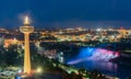 Night aerial view of the Skylon Tower and the beautiful Niagara Falls Royalty Free Stock Photo