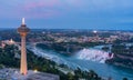 Night aerial view of the Skylon Tower and the beautiful Niagara Falls Royalty Free Stock Photo