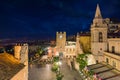Night aerial view of Square Piazza IX Aprile with San Giuseppe church and Clock Tower in Taormina, Sicily, Italy Royalty Free Stock Photo