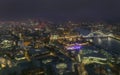 Night aerial view of Tower Bridge and City of London, England Royalty Free Stock Photo