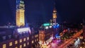 Night aerial view on town hall square with trumpeters with lures and tower of one hotel in Copenhagen